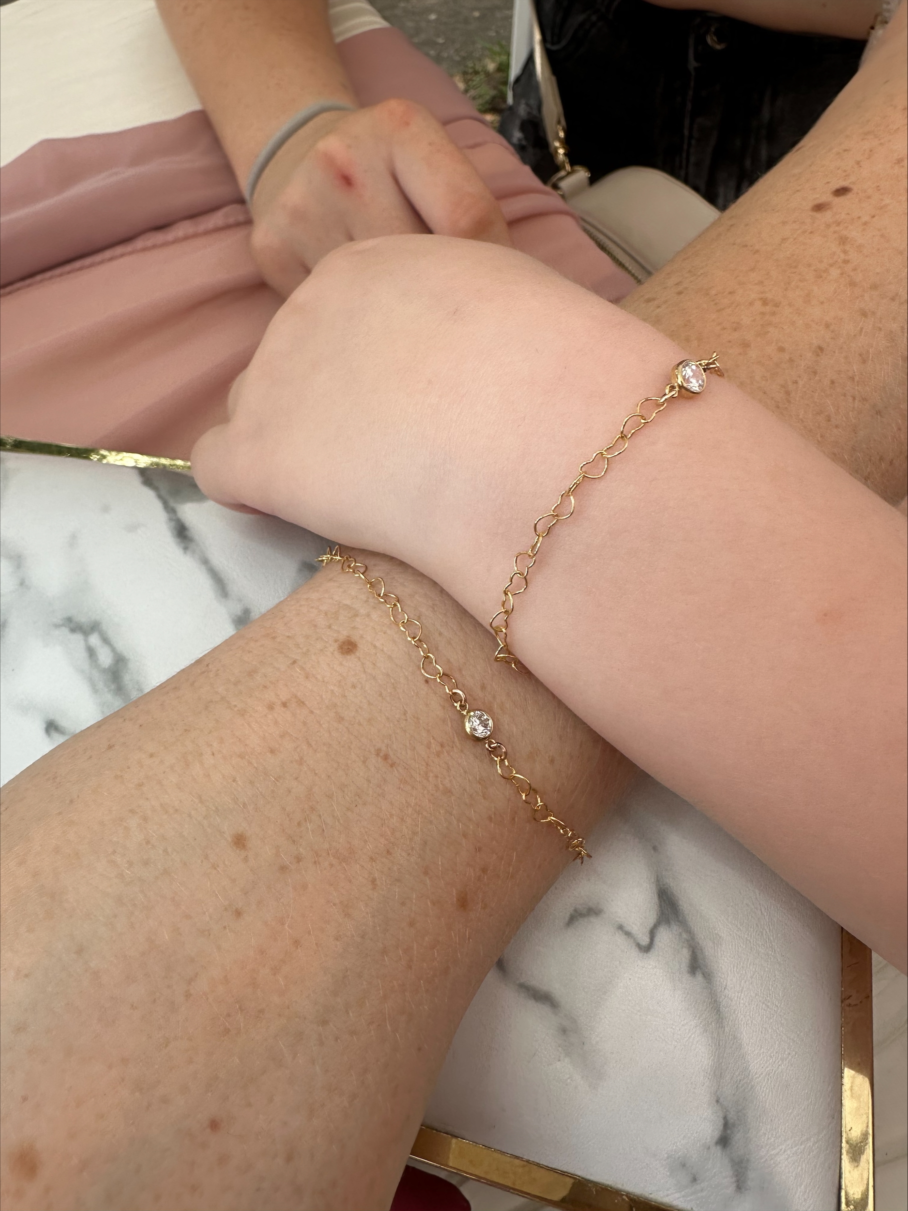 Gold permanent bracelet welded on wrist